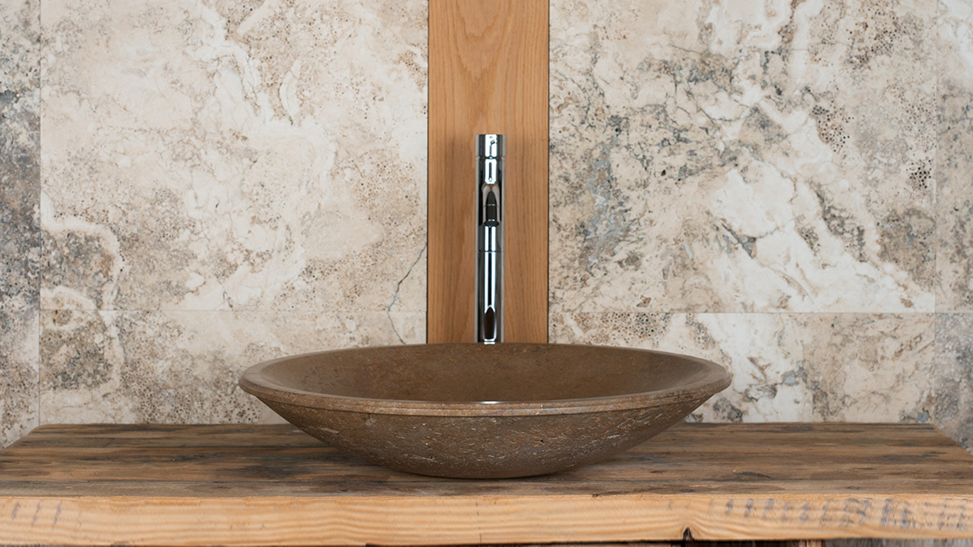 Round dark travertine washbasin “Fonterutoli SC”