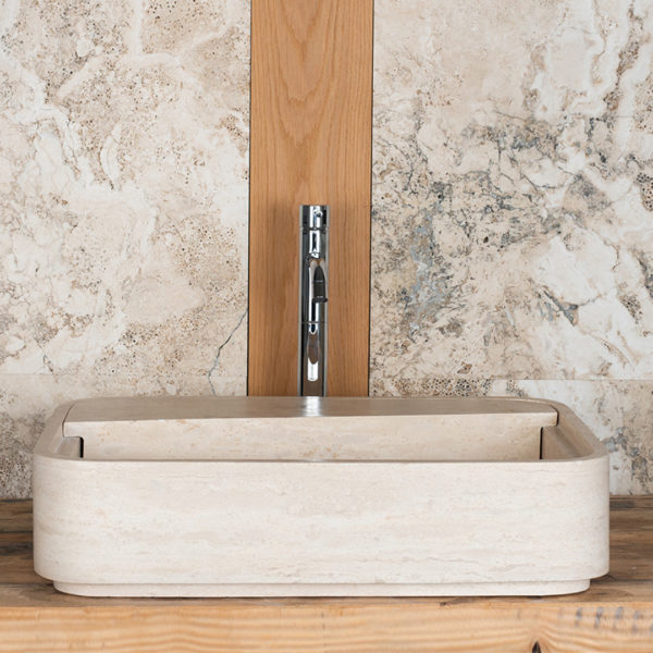 Designer travertine washbasin "Loaded"