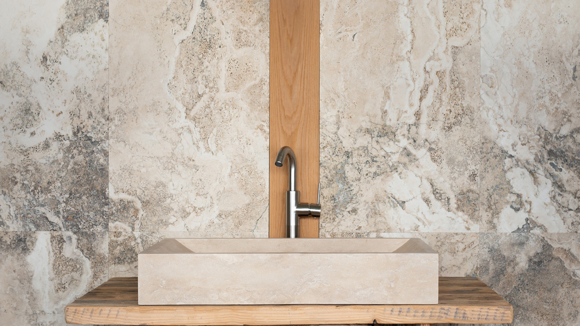 Rectangular travertine washbasin “Wave”