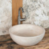 Round travertine washbasin “Ball”