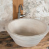 Round travertine washbasin "Castellina"