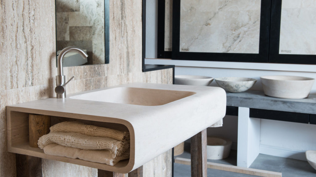 Designer travertine washbasin “Cave”