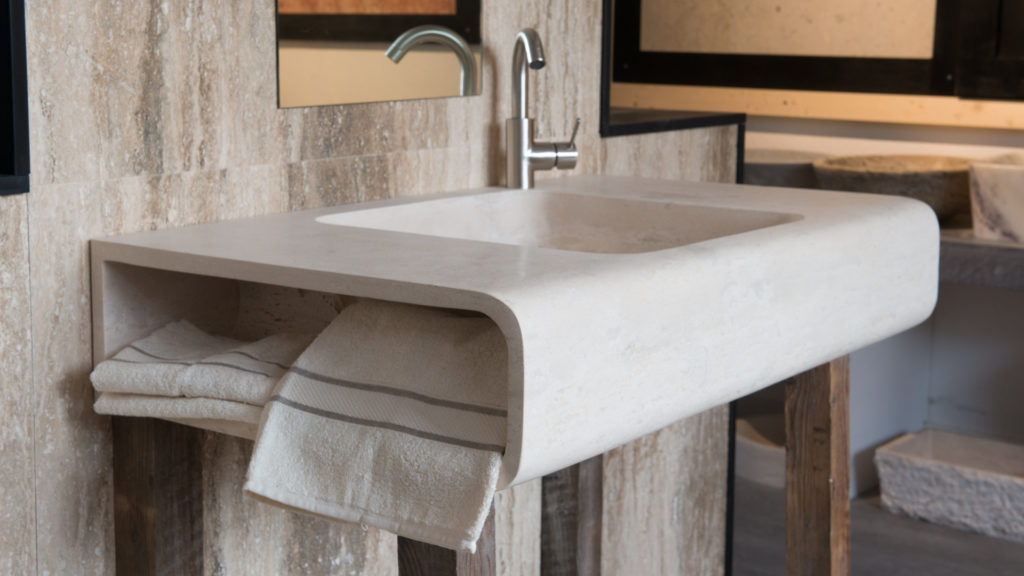 Designer travertine washbasin "Cave"