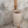 Freestanding travertine washbasin "Colonna"