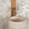 Freestanding travertine washbasin "Colonna"