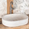 Oval travertine washbasin "Soap"