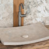 Minimal travertine washbasin “Foglio”