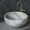 Lavabo tondo in travertino grigio "Fiano Ice"