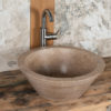 Lavabo tondo in travertino noce "Gaiole Scuro"