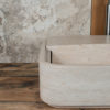 Lavabo di design in travertino "Loaded"