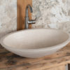 Oval travertine washbasin "Ovetto CH"