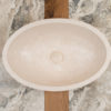 Oval travertine washbasin "Ovetto CH"