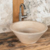 Small, round travertine washbasin "Talla"
