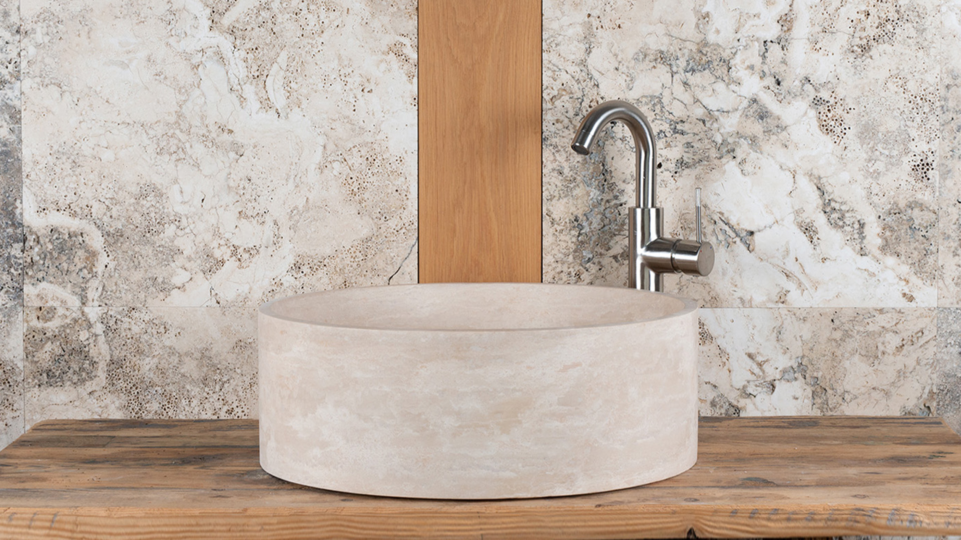 Round travertine washbasin “Tonda Slim”