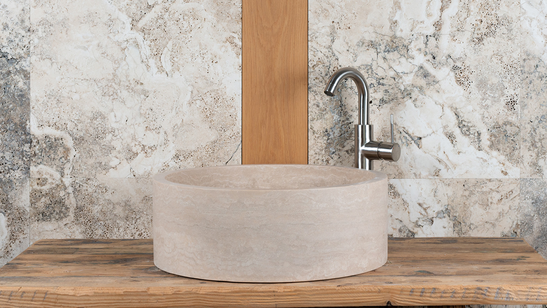 Round travertine washbasin “Tonda”