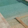 Bordi piscina in Travertino in falda "Light Blend" / costa a toro