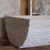 Designer travertine washbasin "Mustang"