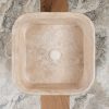 Freestanding travertine washbasin “Trapezio”