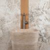 Freestanding travertine washbasin “Trapezio”