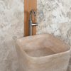 Freestanding travertine washbasin “Trapezio”