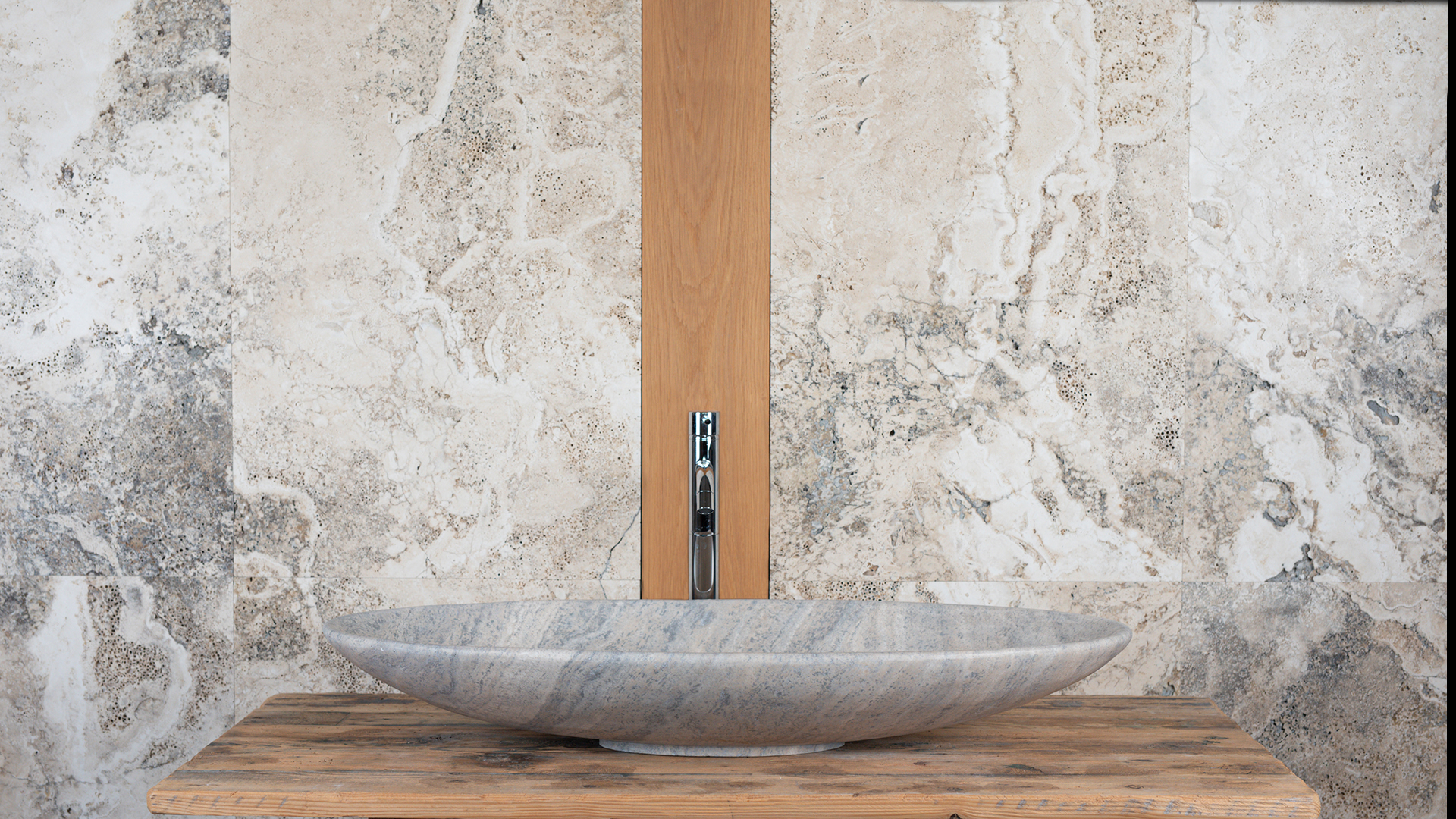 Lavabo ellittico in travertino “Elipse Ice”