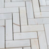 Mosaic in "Bianco Alba" marble “Spina Piccola ” Honed