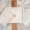 Rectangular travertine washbasin “Piatto”