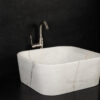 Square sink in white marble