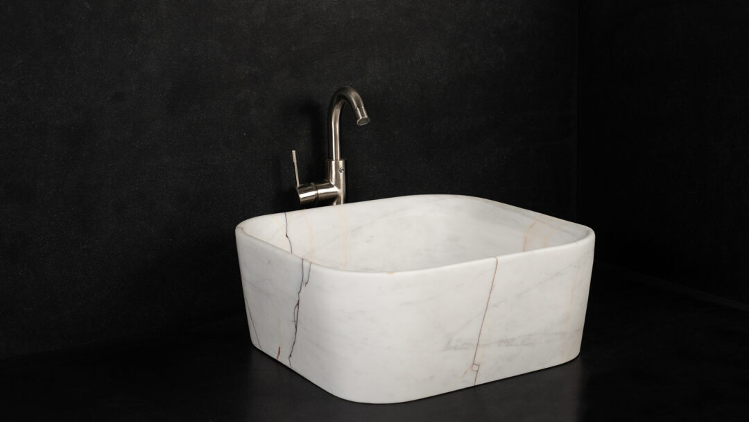 Square sink in white marble