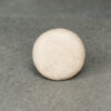 Light travertine drain stopper top