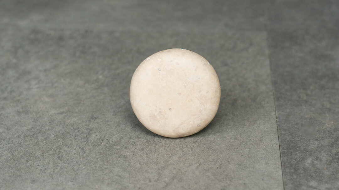 Light travertine drain stopper top
