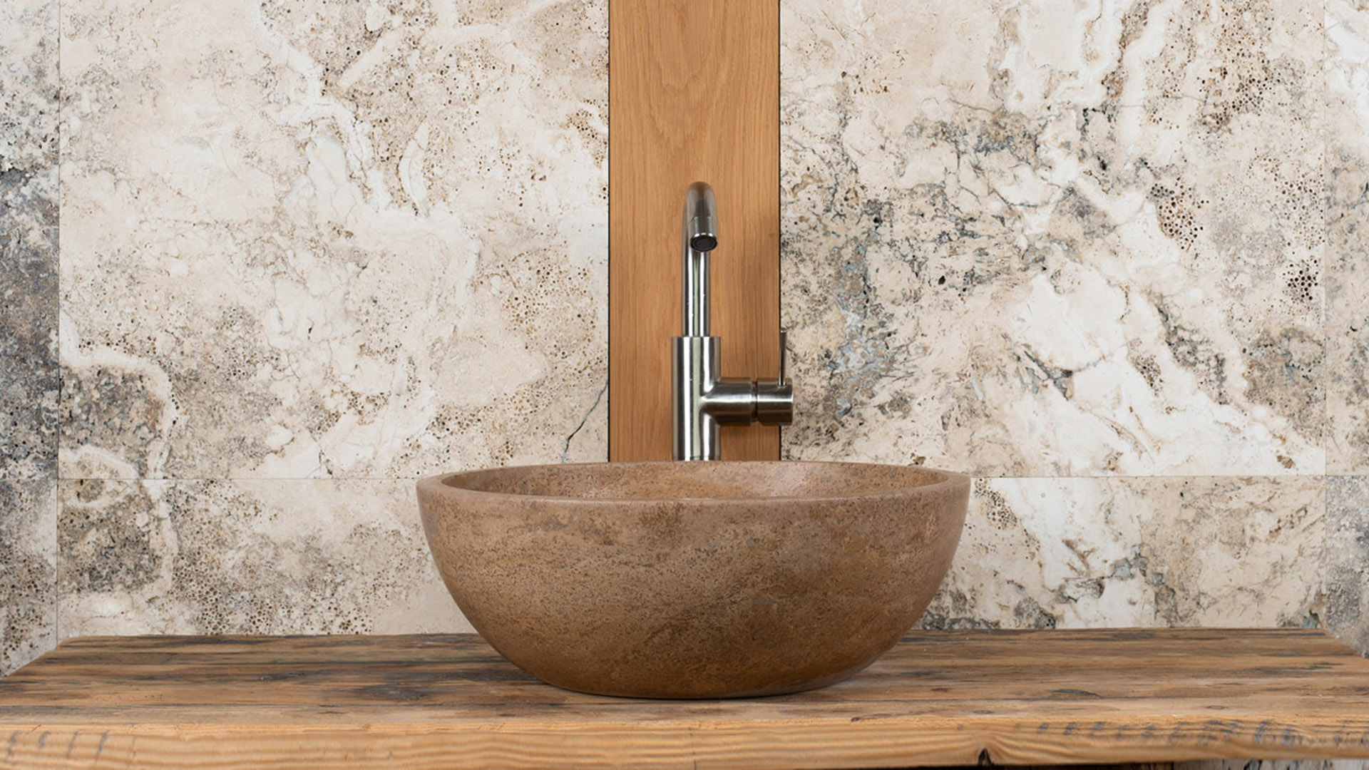 Lavabo rotondo in travertino &ldquo;Ball Scuro&rdquo;