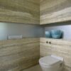 Rivestimento bagno in travertino controfalda Zebra Silver Grey
