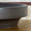 Particolare lavabo in basalto nero
