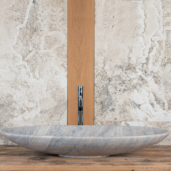 Lavabo ellittico in travertino “Elipse Ice”
