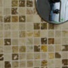 Mosaico in travertino su rete rustico
