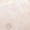 Flat shower base flush with the floor