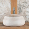 Countertop sink in light travertine - model Pozzo