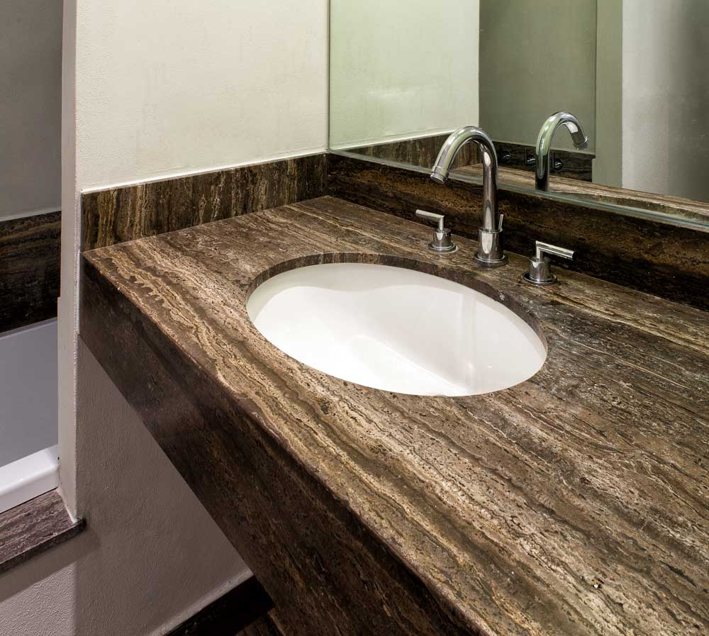 Top lavabo in travertino nero su misura