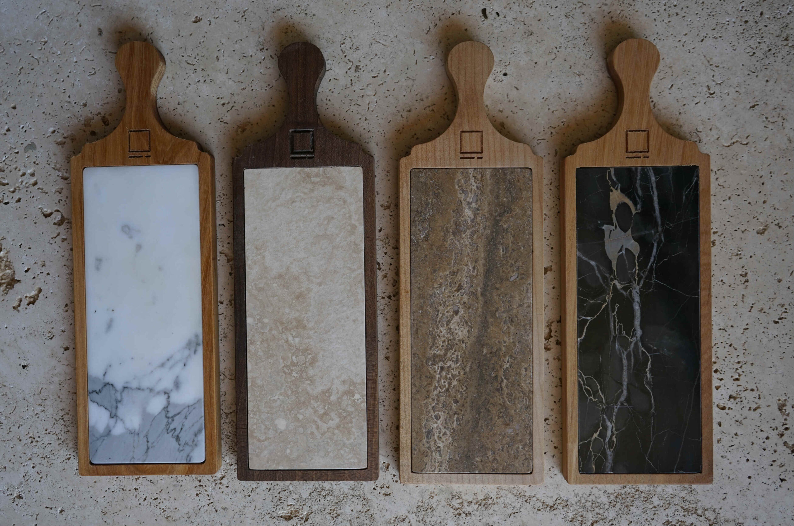 Handcrafted travertine and marble cutting boards